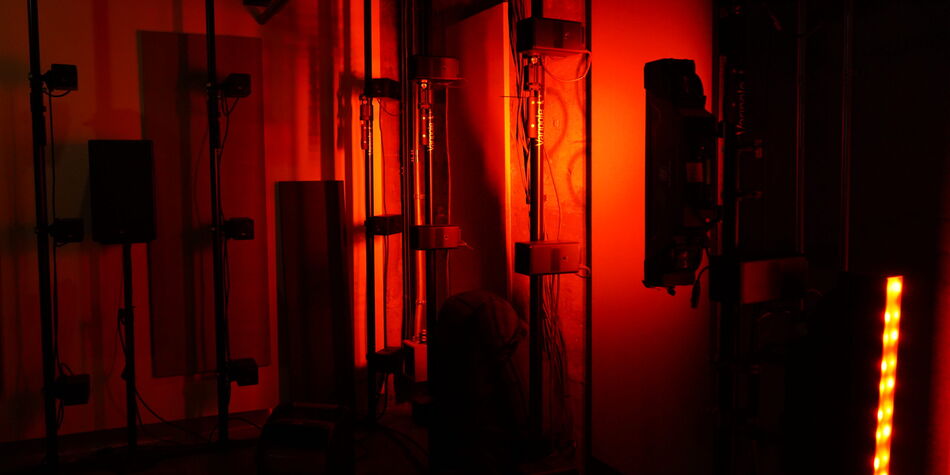 Scenography project initiated by the SAT. Red light and installations.