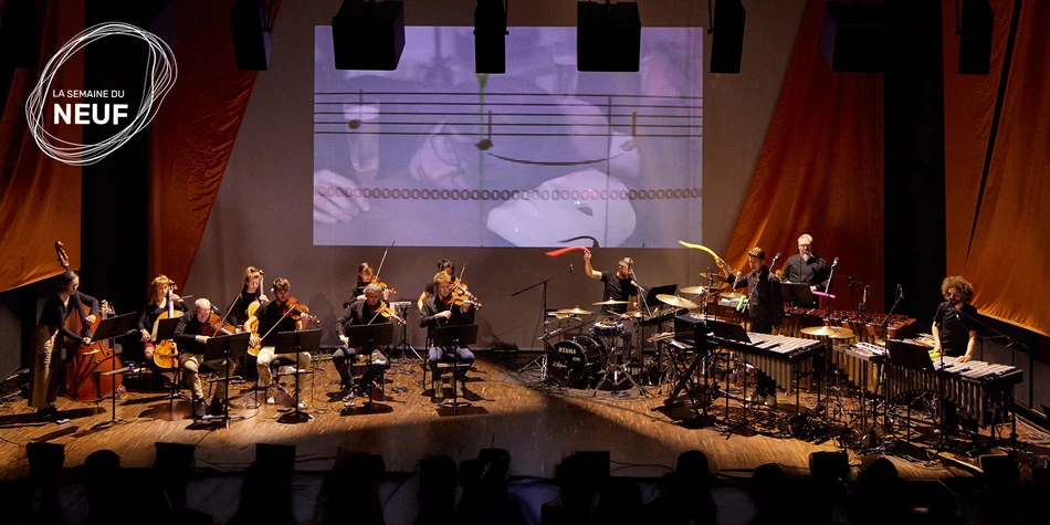 Photo of 2 ensembles on stage